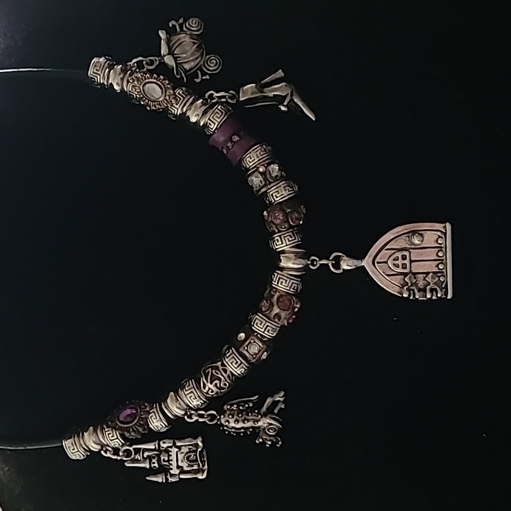 Hand crafted necklace with fairy tale charms